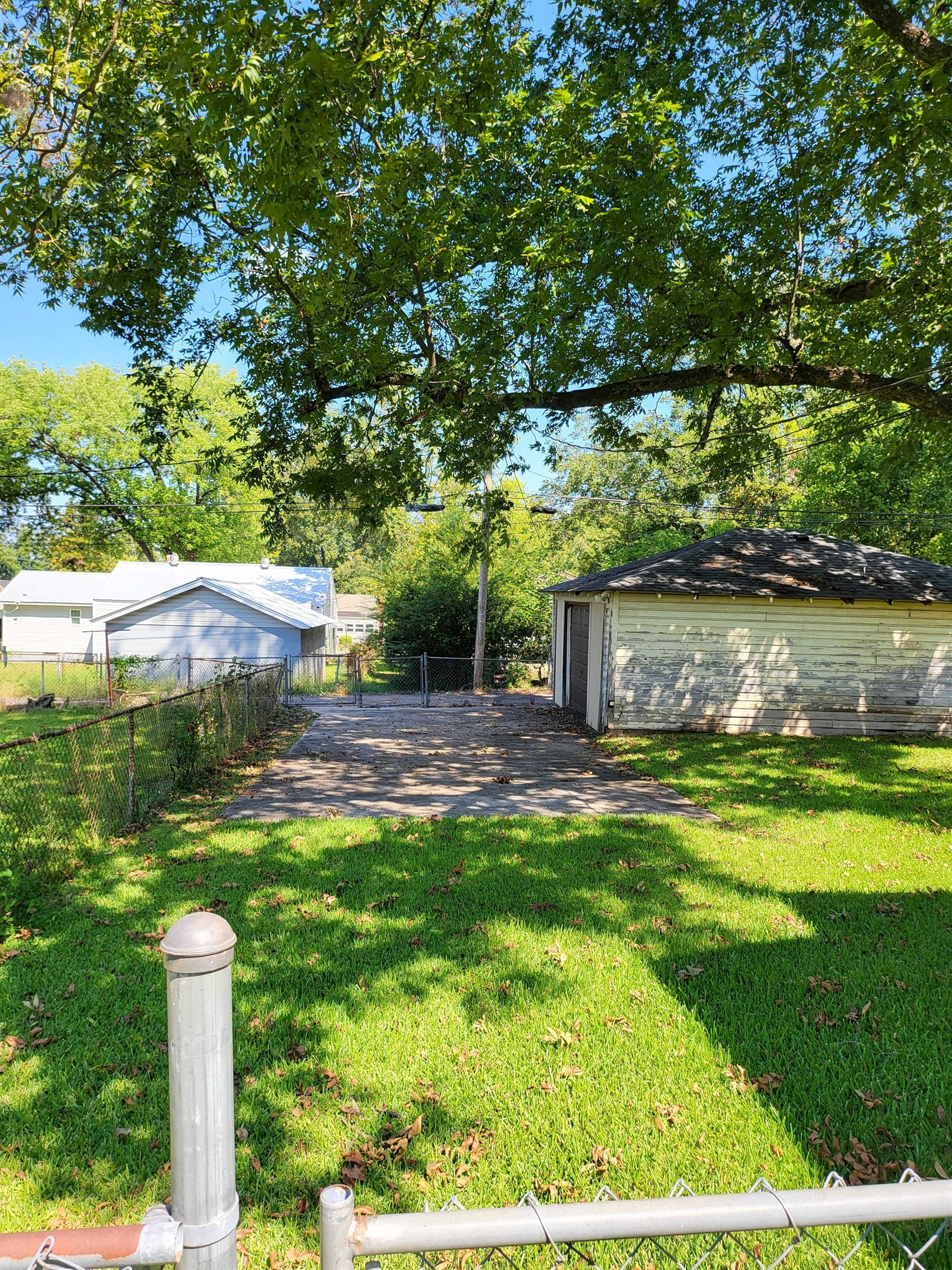 Let the day wind down in a spacious yard made for relaxing, playing, or simply being still