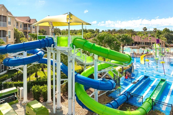 Water slides, splash zone and heated zero entry lagoon style pool, all included with your villa rental.