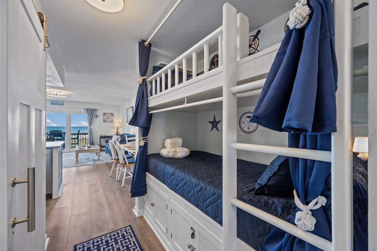 Smart use of space with built-in bunks that keep the layout open and functional