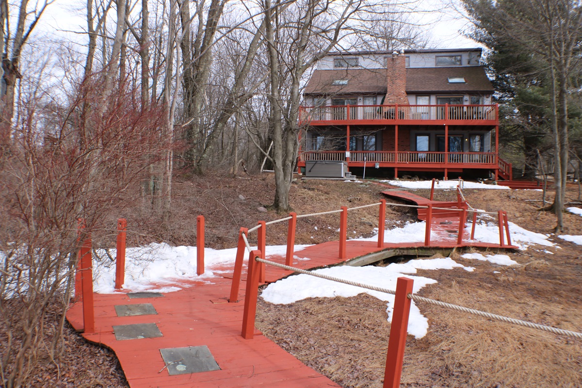 New Boardwalk view at back of house. Boardwalk rehabbed & painted in 2025.
