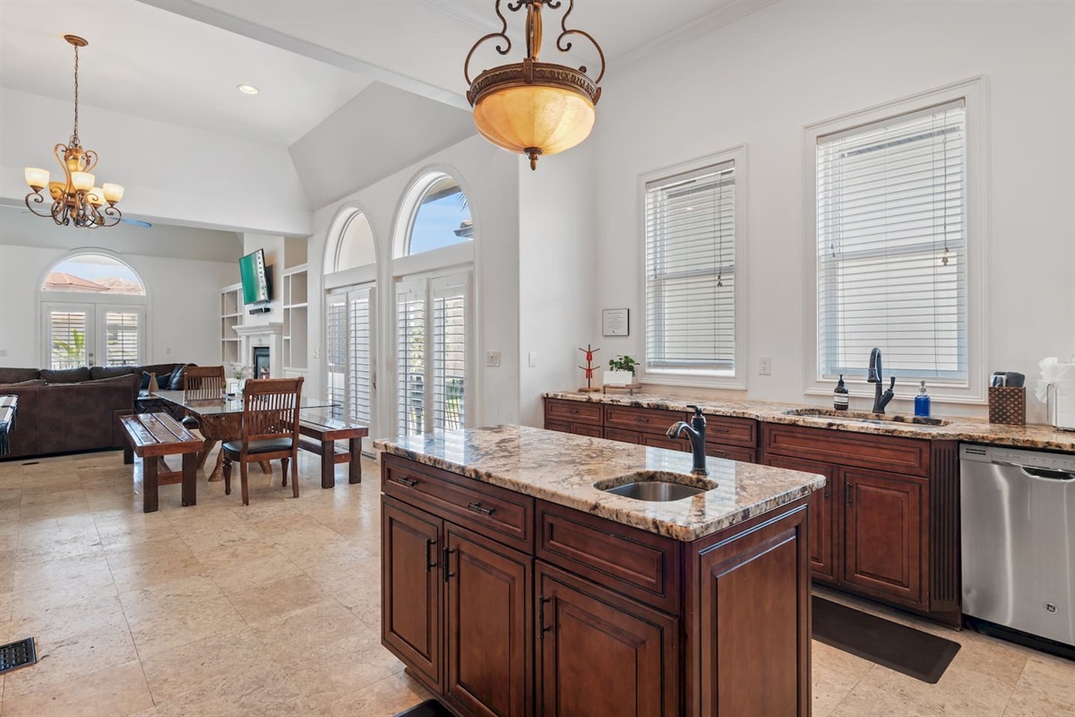 Kitchen island with prep sink and ample workspace