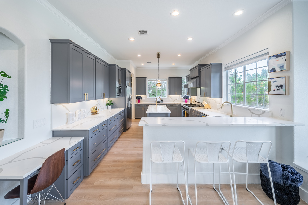 Expansive kitchen island with bar seating — ideal for entertaining large groups.