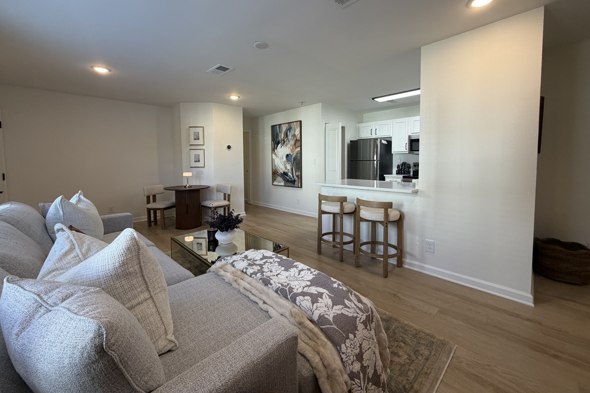 Pull up a stool at the breakfast bar or take the dining table; it's all one open room.