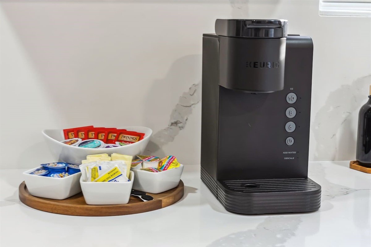 Coffee station with complimentary coffee, tea, sugar and creamer-enjoy!