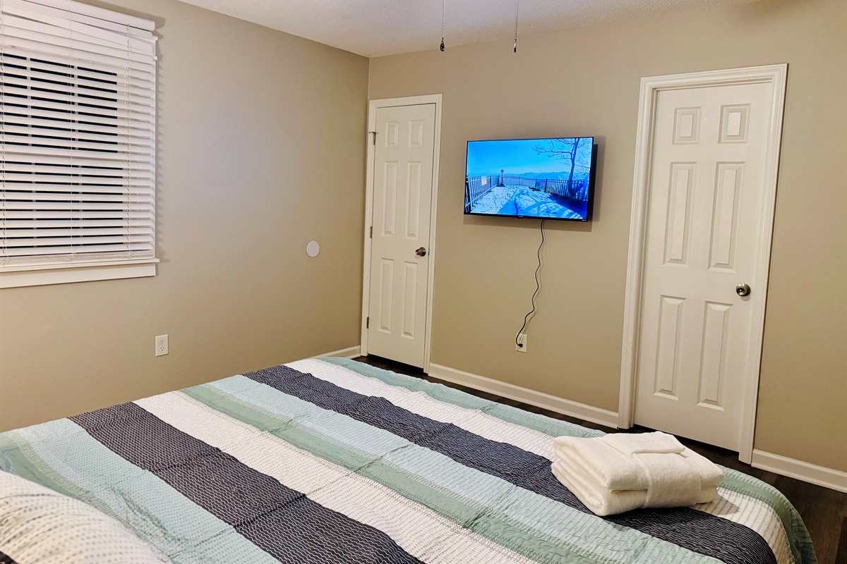 King Bedroom #1 - Main Level - Nectar mattress, 43 in Smart TV and desk area. This room also has a walking closet. 