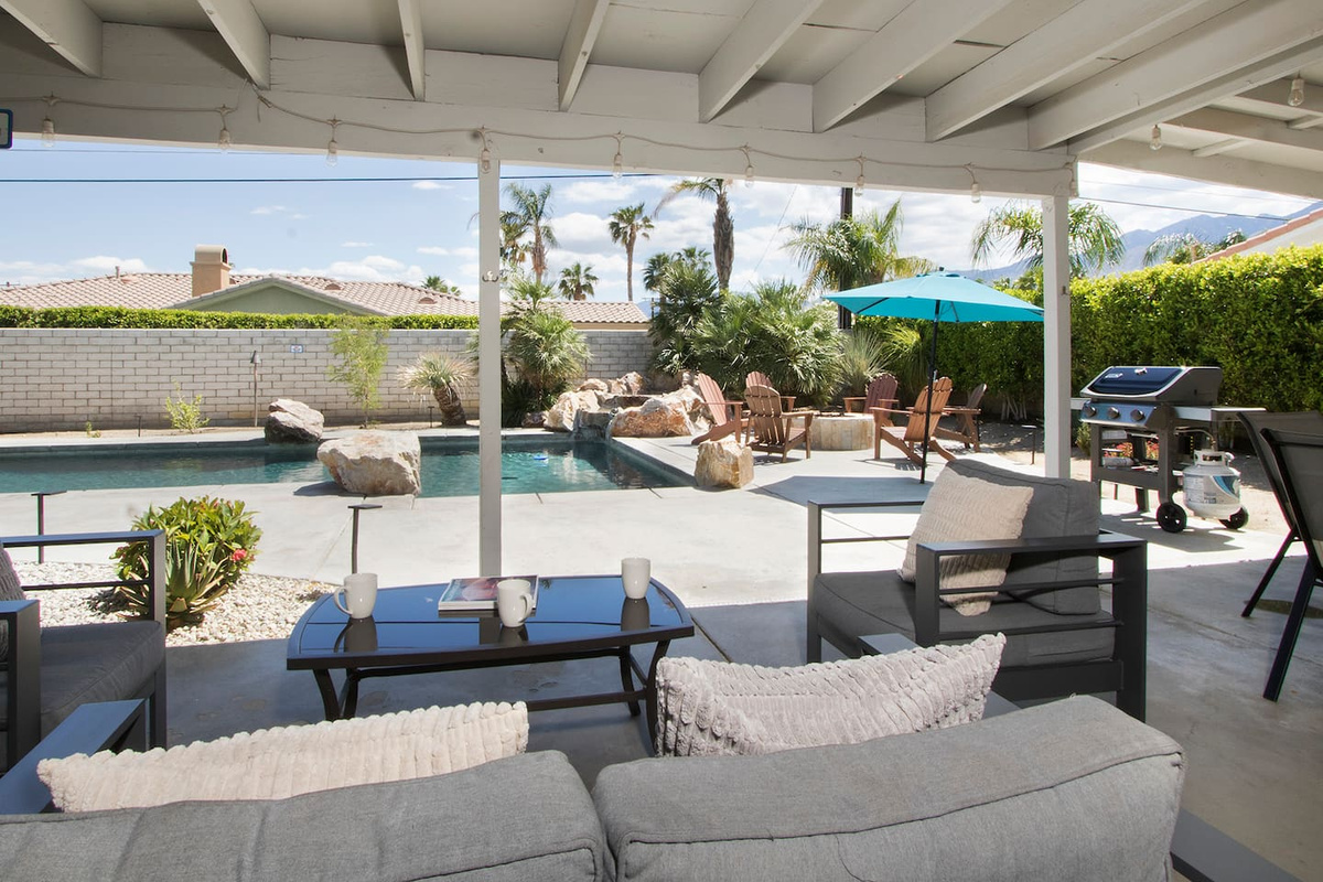 Outdoor lounge area near the pool! Great for morning coffee or relaxing in the shade while others swim. 