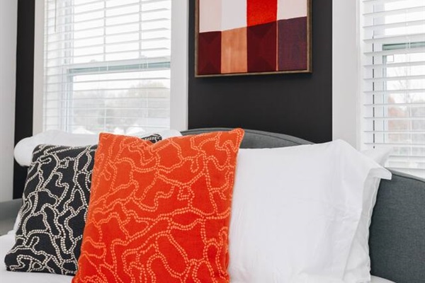 Trendy, modern, and stylish queen bedroom