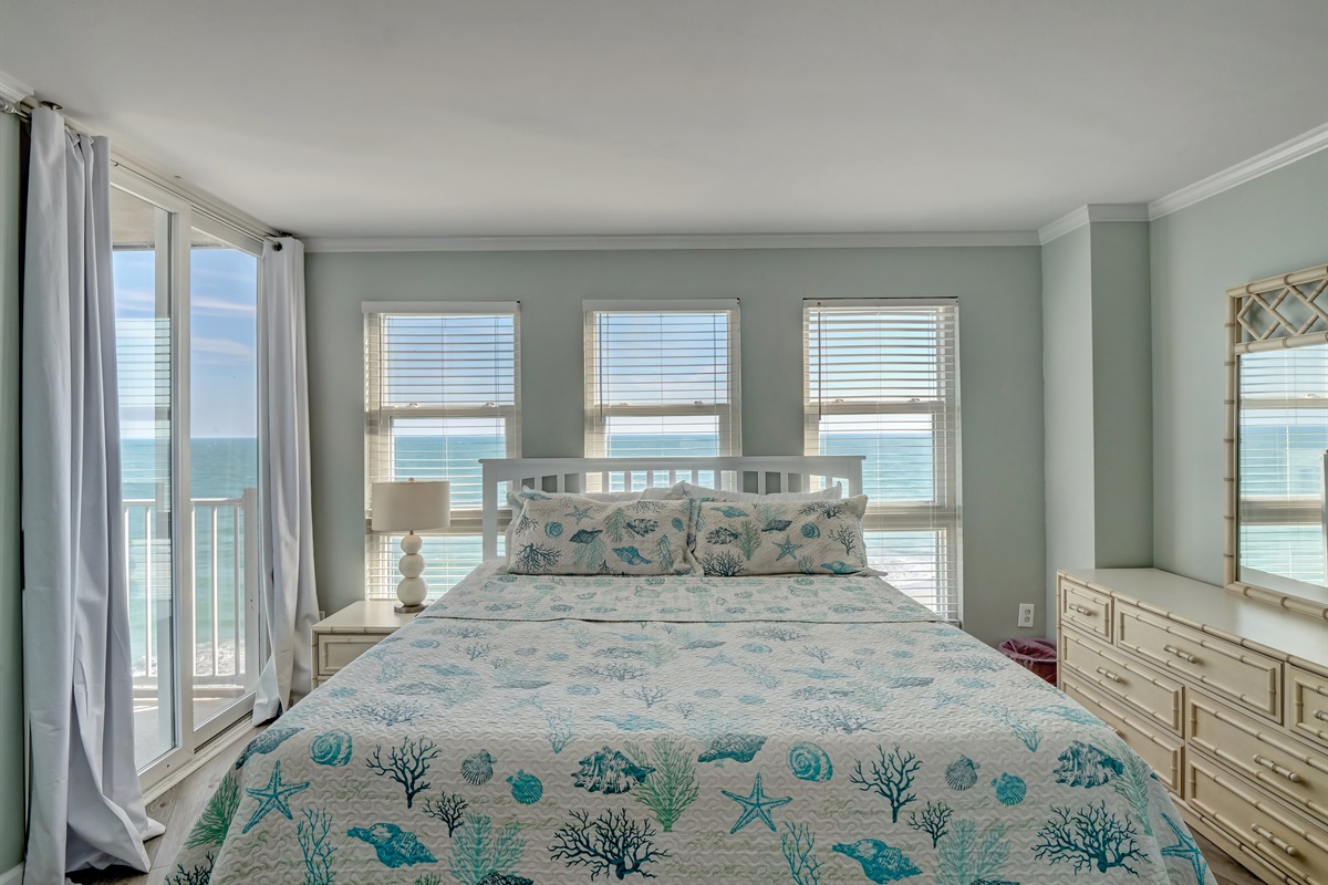 Oceanfront master bedroom with king size bed