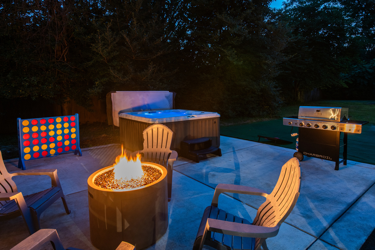 Hot tub, fire pit and back deck area