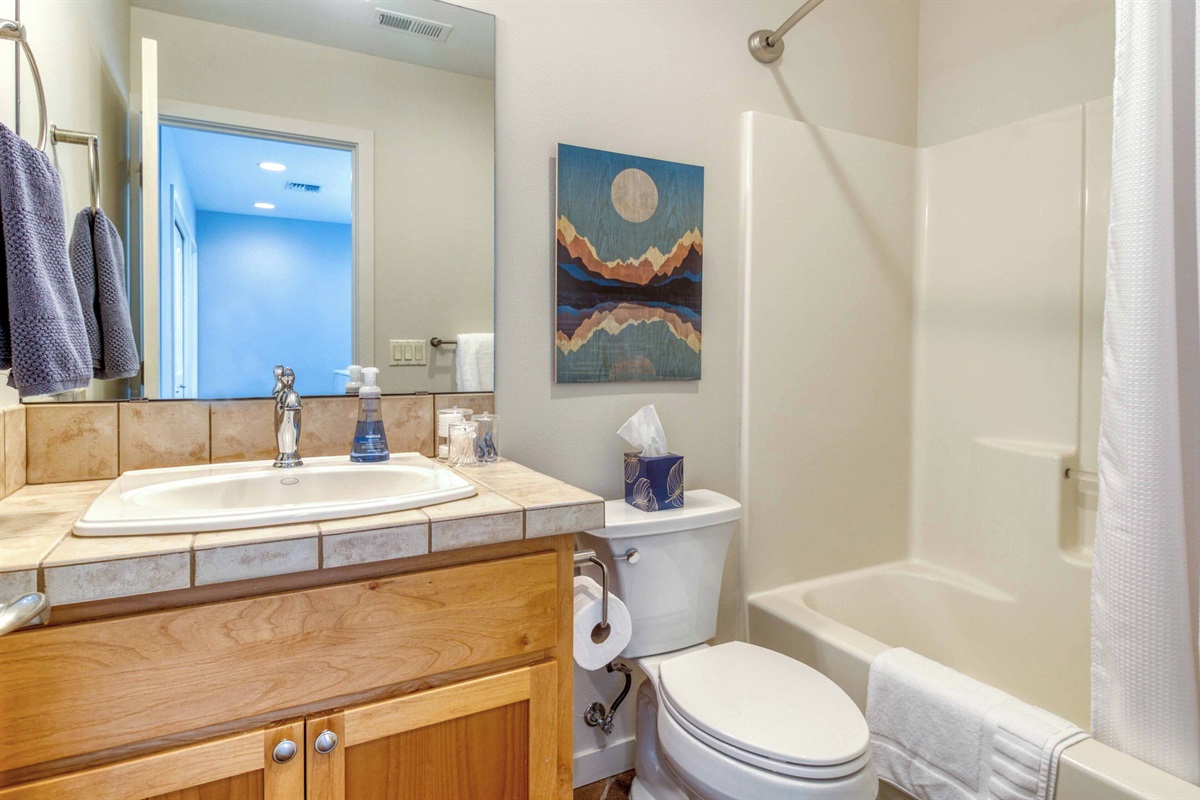 Clean, modern bathrooms stocked with fresh towels and toiletries.