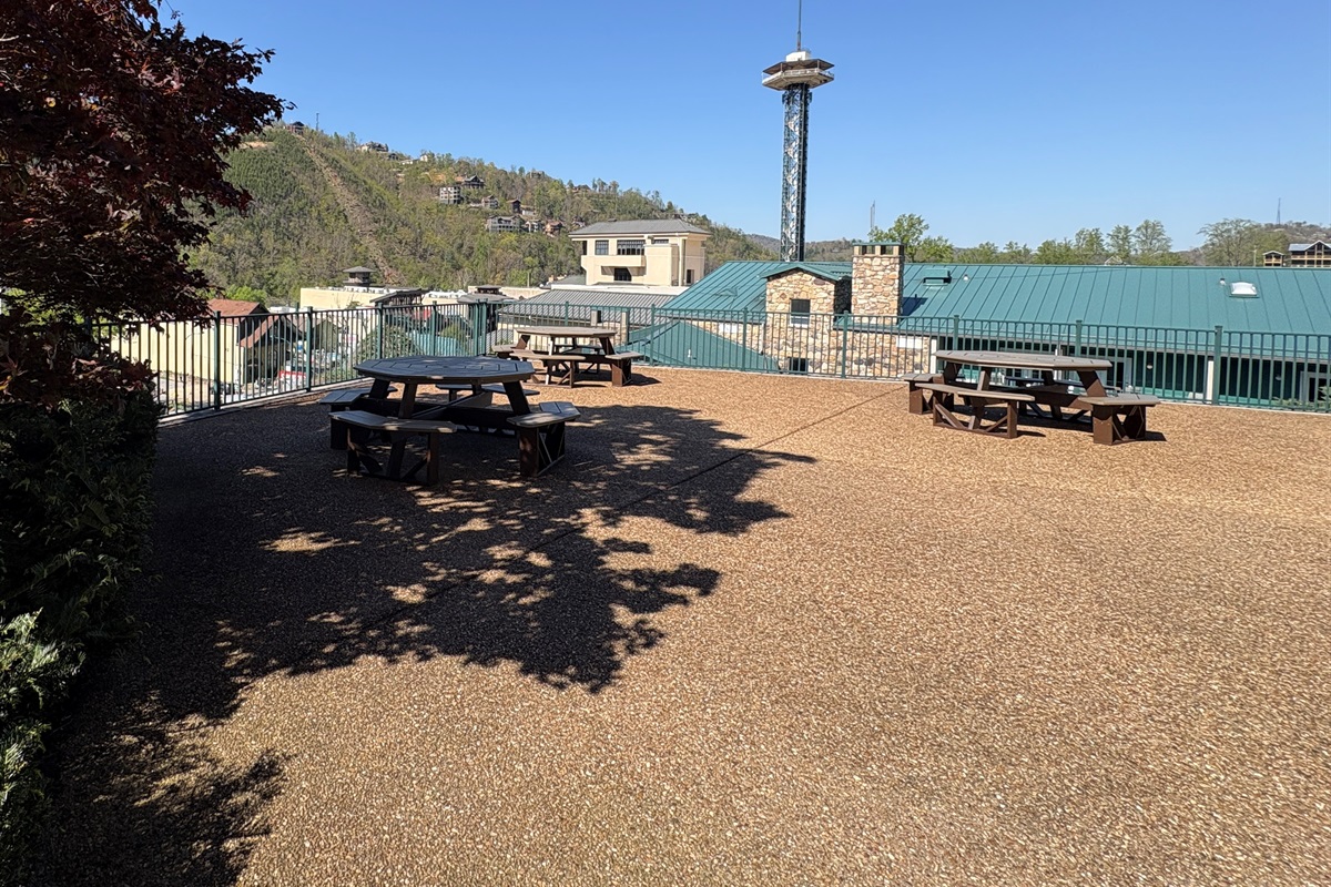 Summit Manor community patio overlooking the strip with new picnic tables.