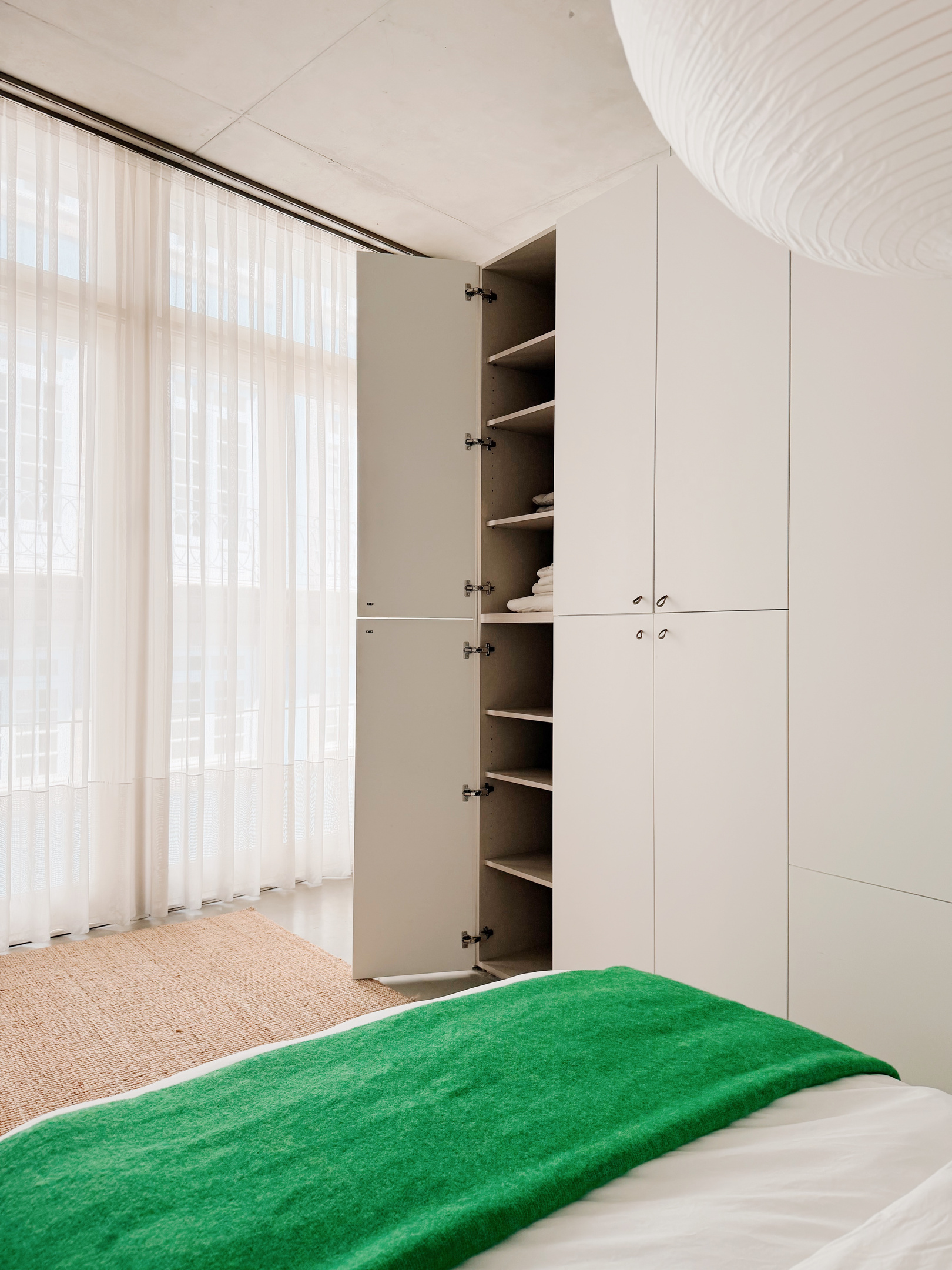 Bedroom storage. The closed cabinets to the right are for hanging clothes.