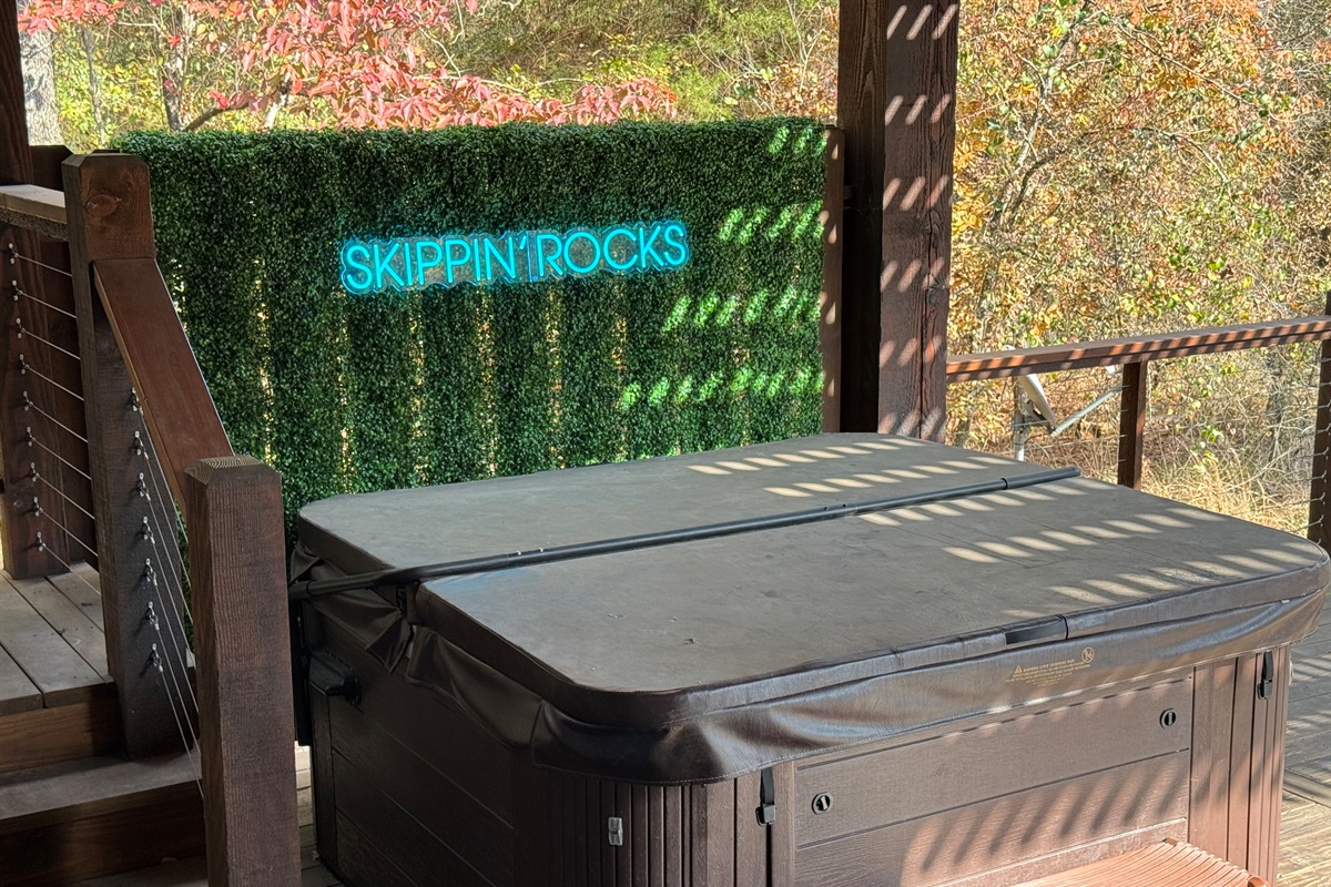 Soak your cares away in the private jetted hot tub overlooking the peaceful pond.