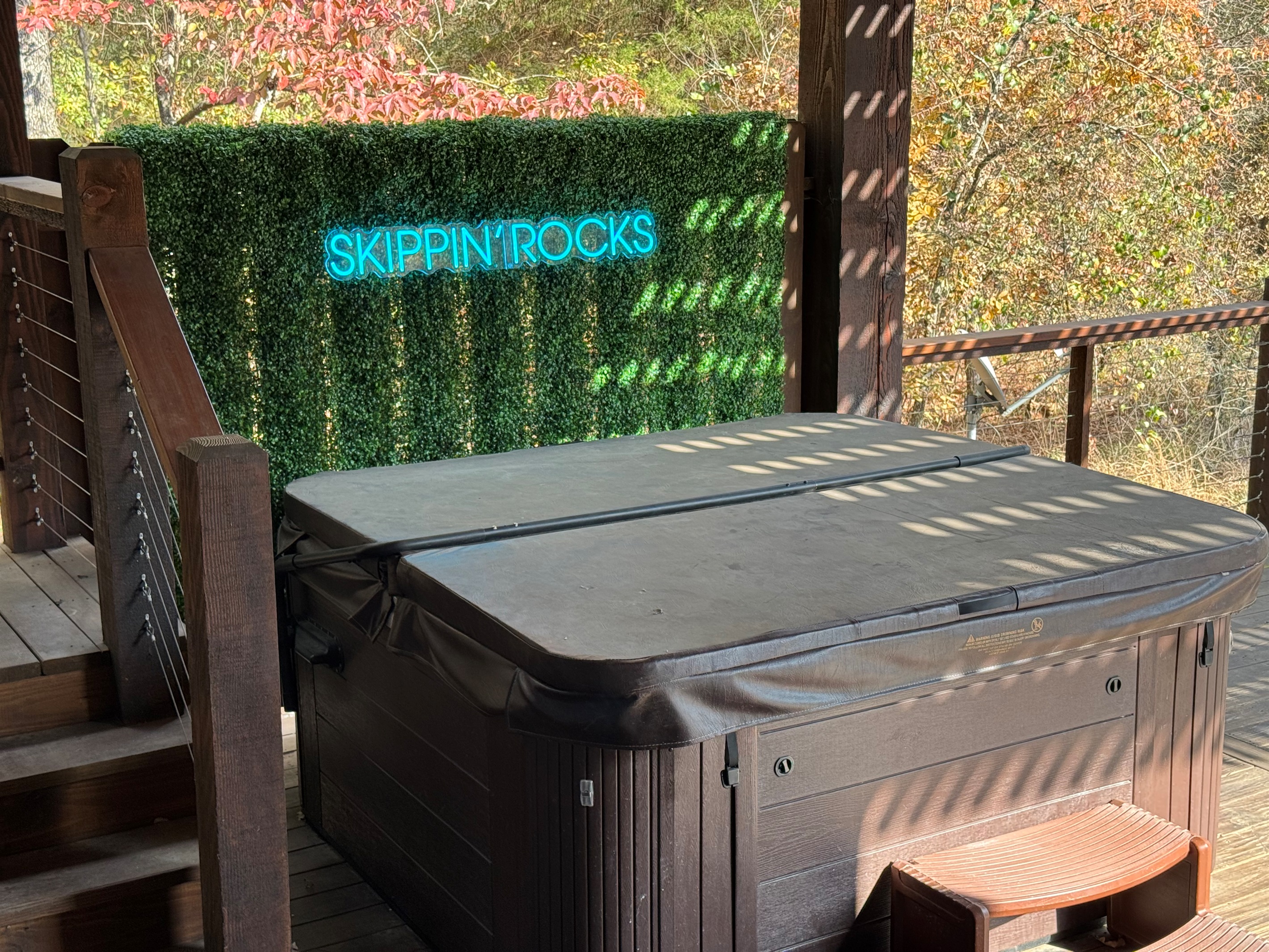 Soak your cares away in the private jetted hot tub overlooking the peaceful pond.