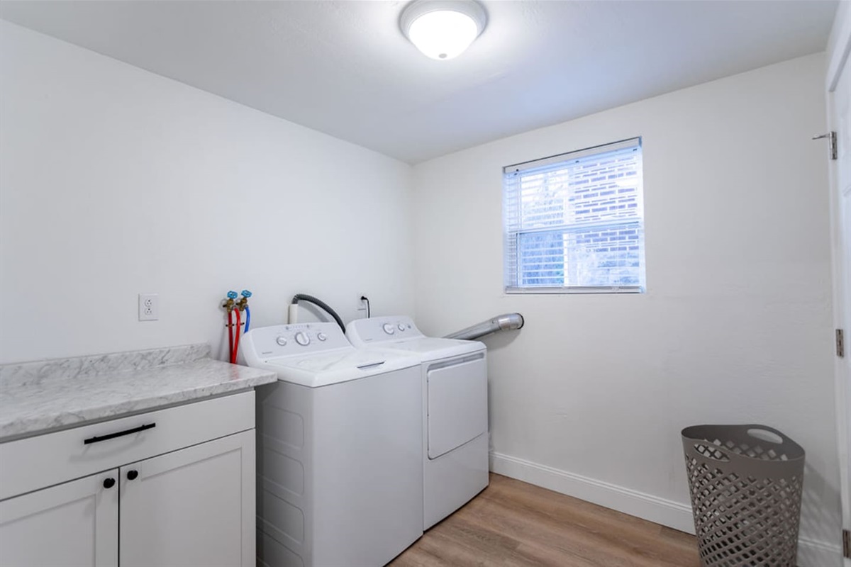 Convenient laundry area featuring a washer and dryer for your comfort during your stay.