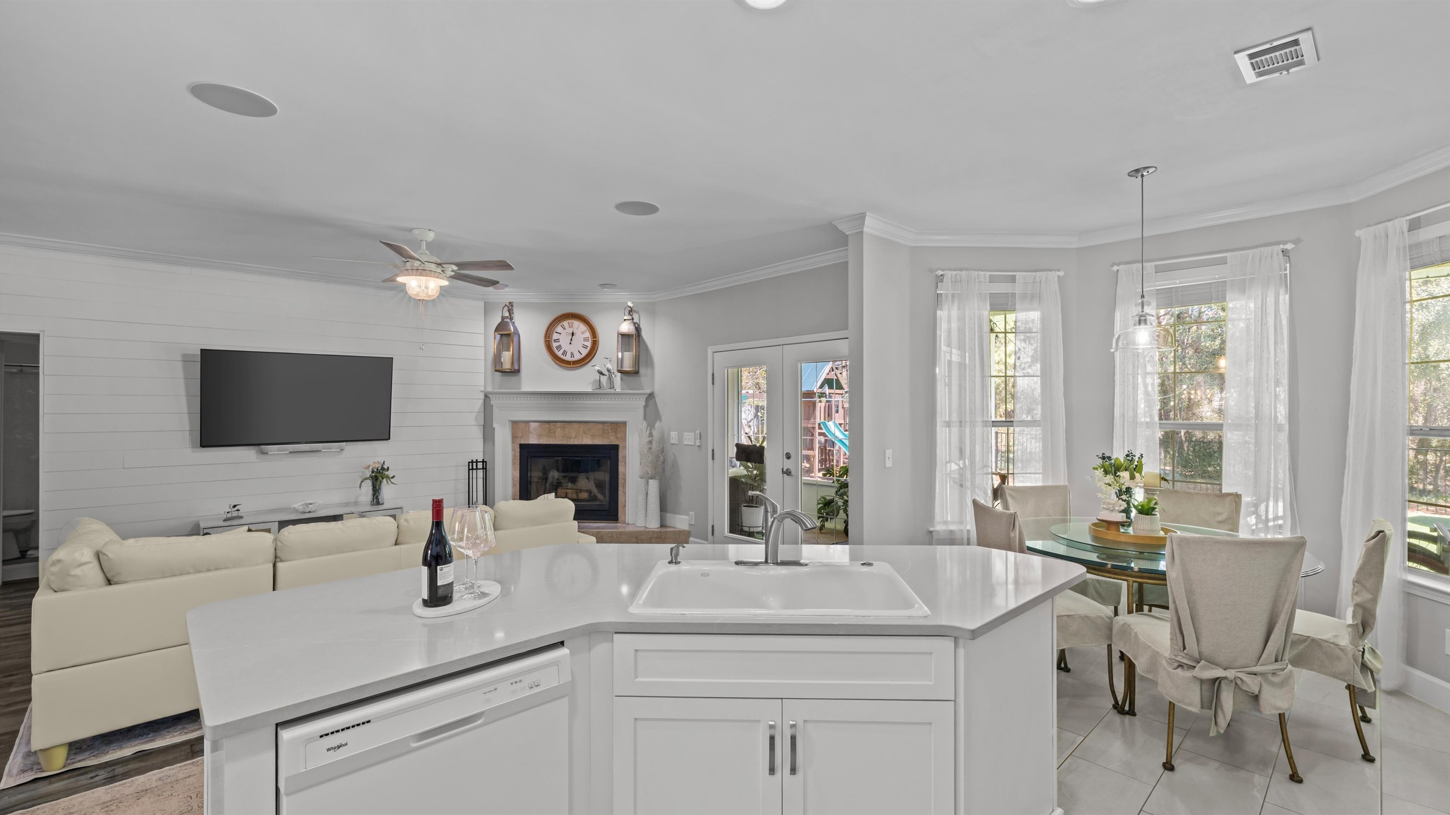 Bright, open kitchen flows right into the living and dining- so everyone stays part of the fun.