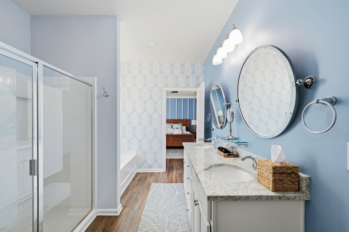 Dual sinks and generous counter space make mornings effortless for couples and families