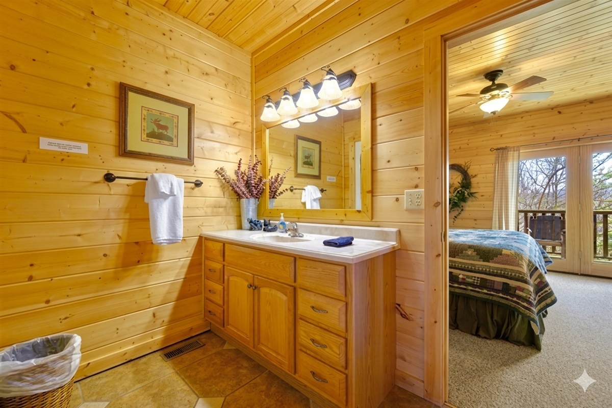 Bathroom #3 – Wake up and wander into this inviting bathroom, where morning light and rustic charm set a peaceful tone for the day ahead.