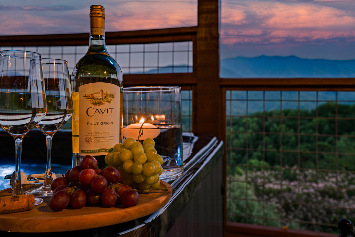 Private and secluded hot tub on the top deck of the cabin overlooking the mountains