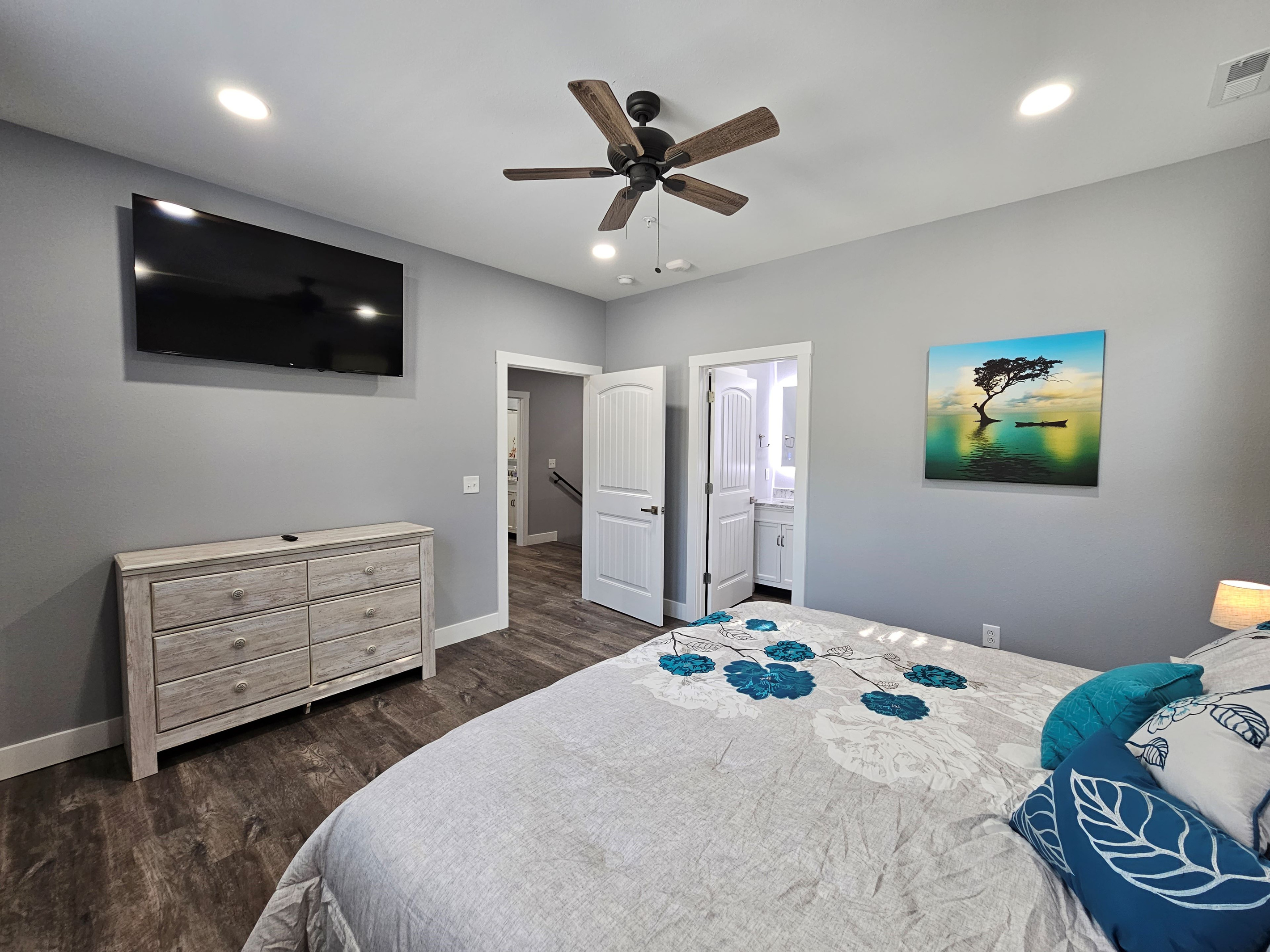 Spacious king suite with smart TV and private bath.