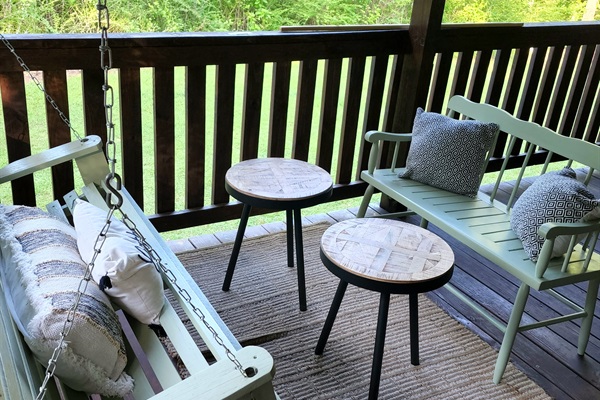 We have swings! This is the third conversation area on the covered front porch.