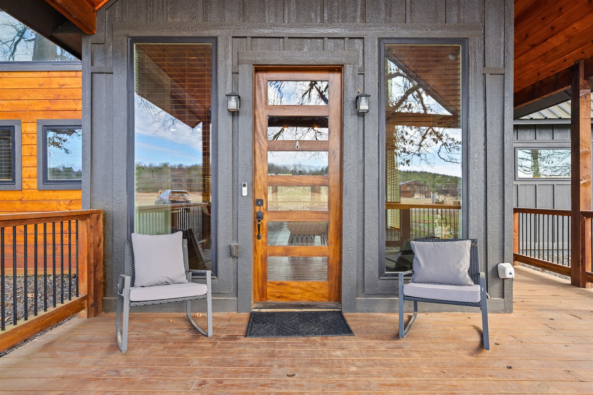 Right at the front entrance, this welcoming porch area makes arriving feel warm, easy, and instantly inviting.