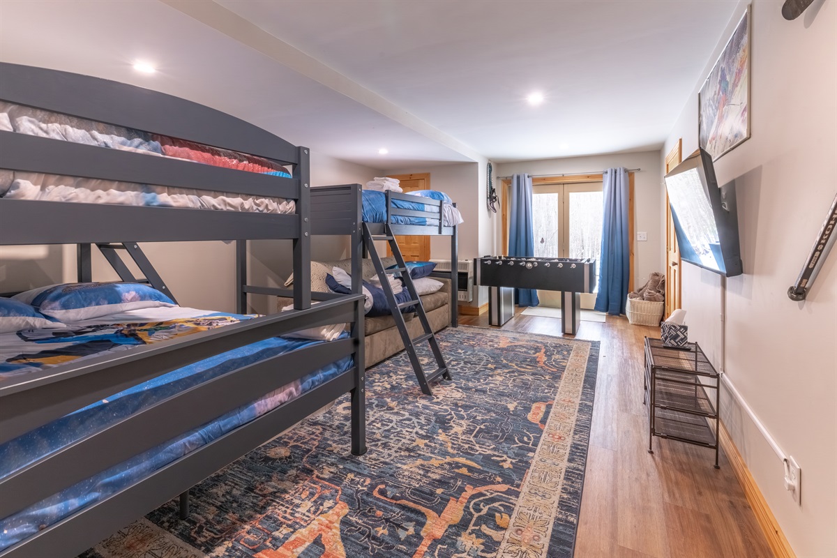 This bedroom sleeps up to 6 with a twin over a full bunk, full loft, and a sleeper sofa!