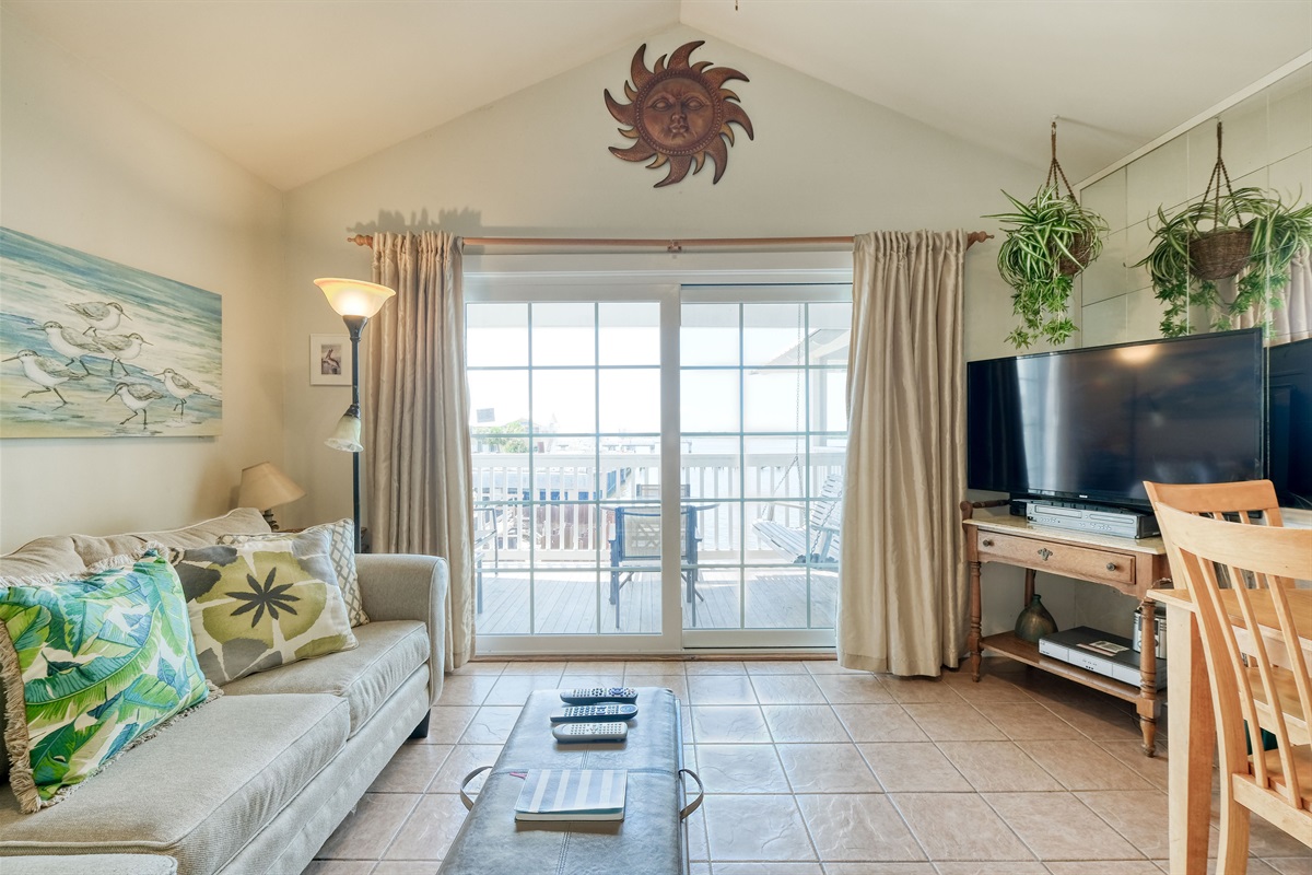 Large sliding glass doors lead to the porch