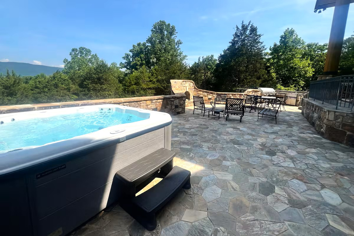 Soak in the hot tub while enjoying breathtaking Shenandoah mountain views