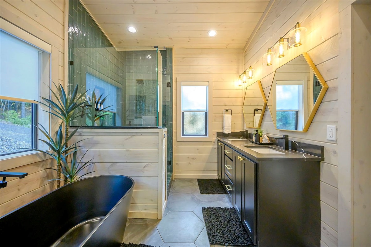 Spa like master bathroom with lots of small touches that makes this so relaxing and enjoyable.