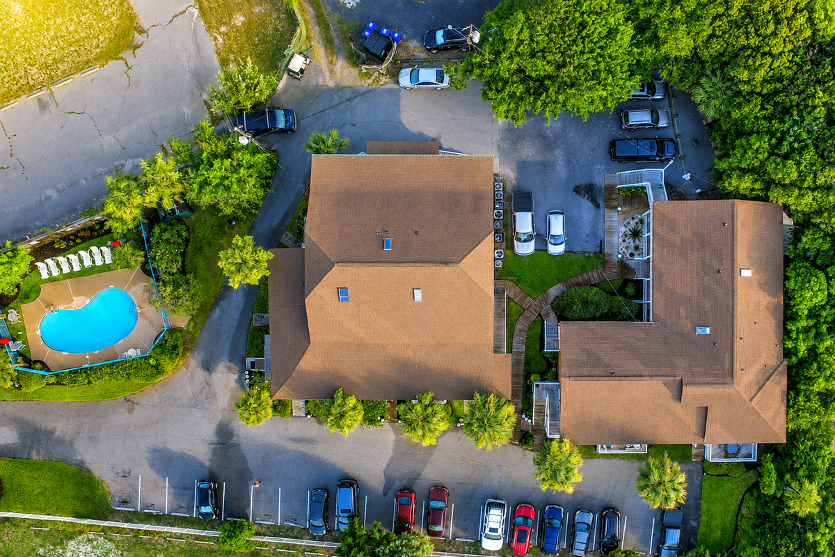 Unit 102 is center top of this photo, located on the back (quietest) side of the property