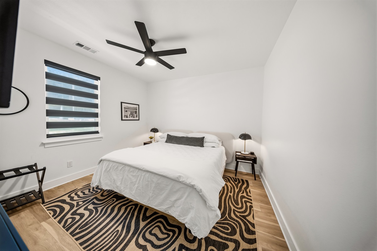 King-sized bed, and a smart TV, providing both comfort and simplicity. Enjoy a restful sleep with our room-darkening shades.