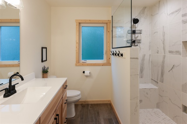 Private ensuite bath with spacious shower.