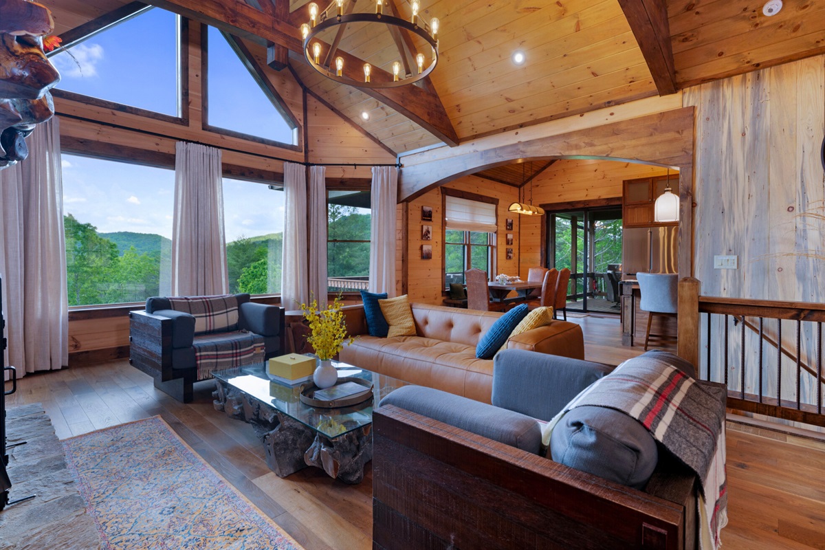 Kick back in this inviting living space, filled with natural light and scenic views from every angle.