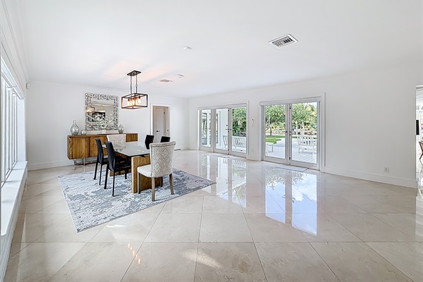Large dining room table with a great open space. 