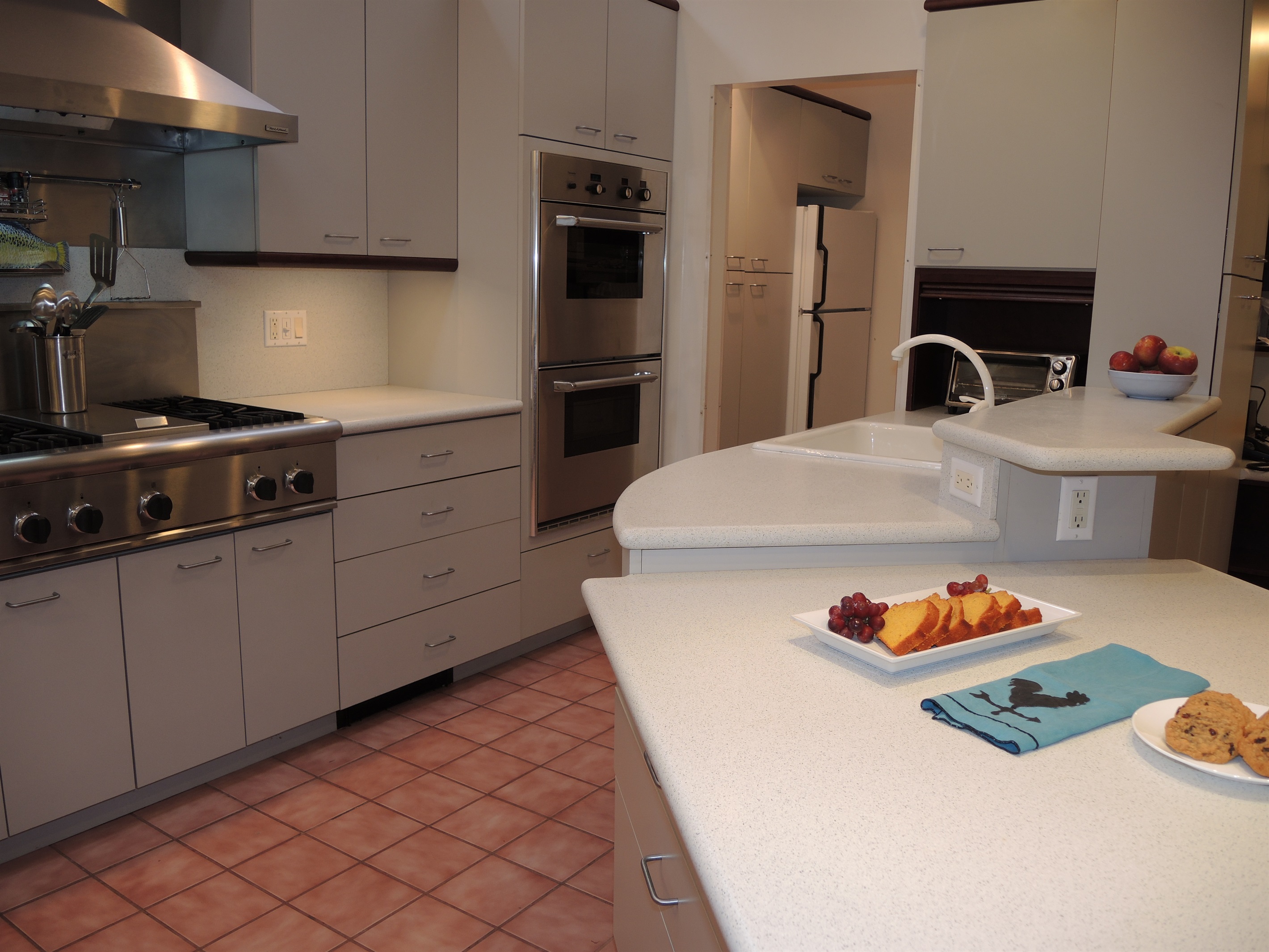 Cook on the 6 burner Thermador range and Double Thermador Ovens! A chefs dream.