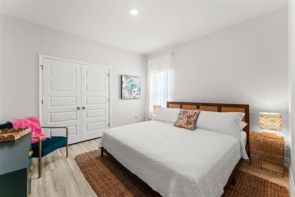 The king bed in the palm room is inviting and perfect for those needing a little more room in the bed