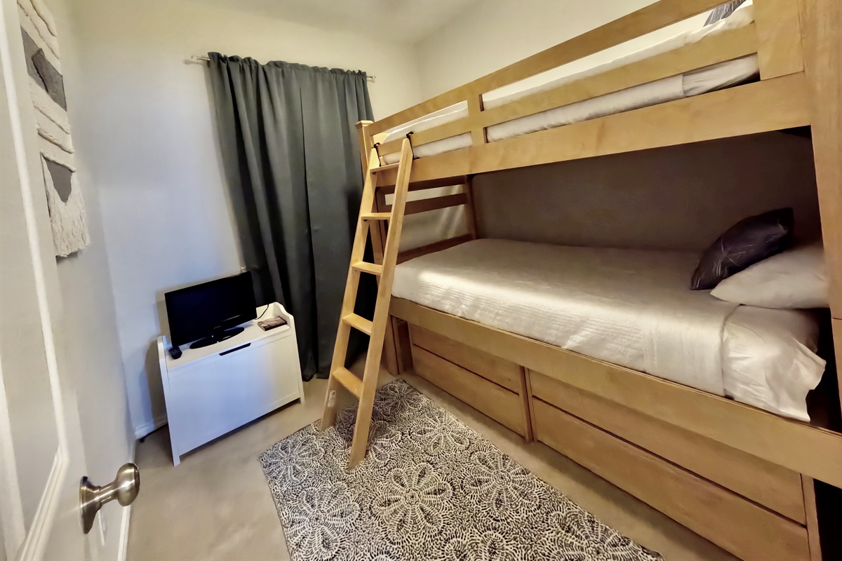 Bunk beds inside queen bedroom on top floor
