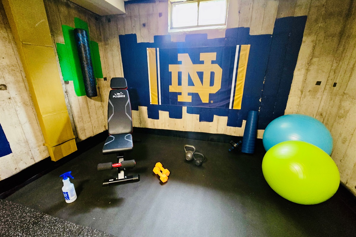 Fuel Your Focus, Channel the Irish Bold ND pride and vibrant gear set the tone—this basement gym is built to ignite your drive, elevate your mindset, and keep you moving toward your goals.