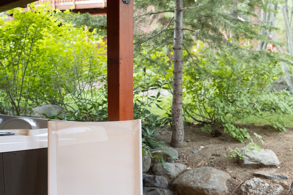 Peaceful back yard area--relax and enjoy the hot tub and private  surroundings.