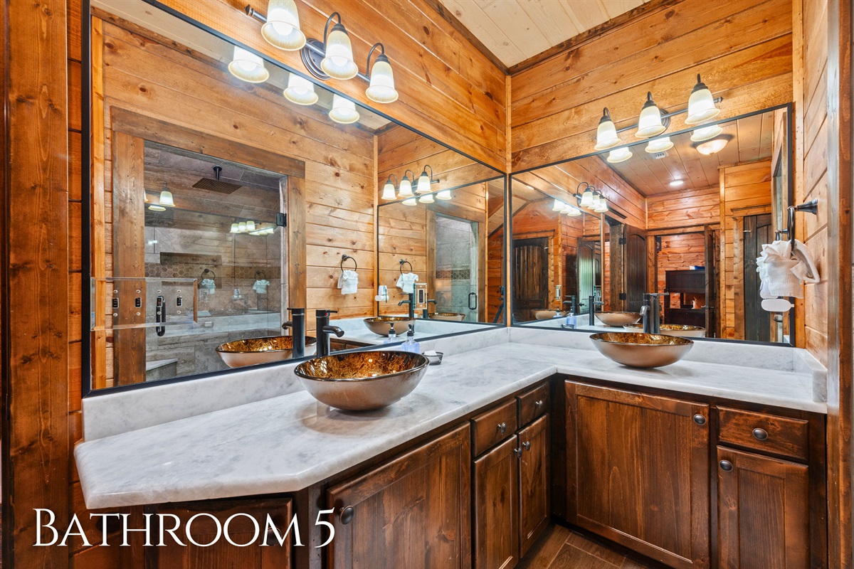 With ample counter space and great lighting, the vanity area is both functional and stylish, making daily routines feel eff
