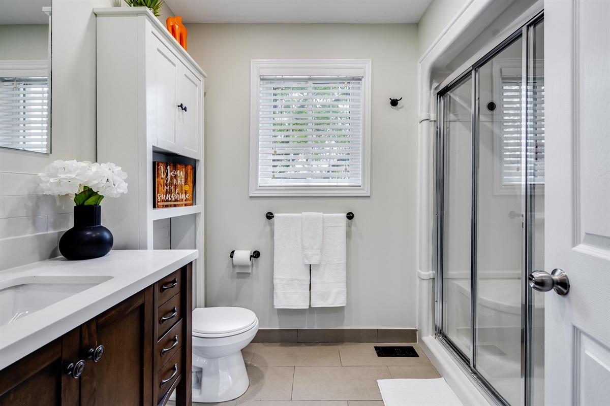 Bathroom with floor to ceiling shower