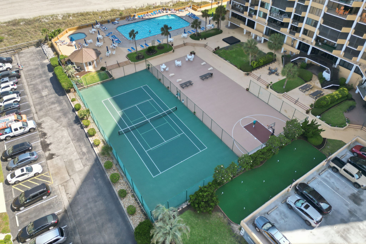 Tennis courts, oceanfront pool, basketball, corn hole and more