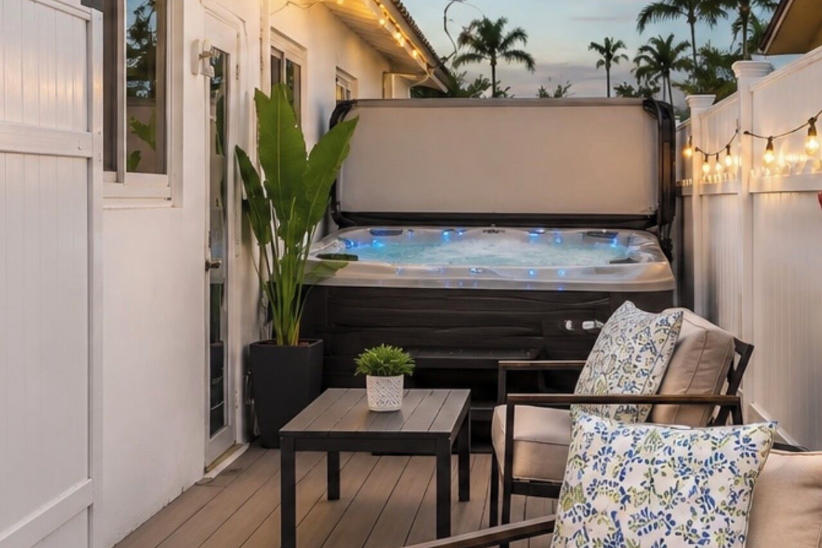 Private patio with fire pit seating and hot tub.  Perfect for relaxing after the beach or exploring Dania Beach or exploring and Fort Lauderdale.