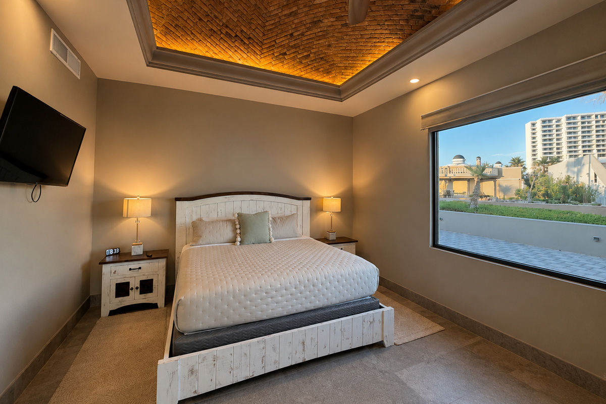 Casita 3: This private guest casita features a king-size bed, Smart TV, ceiling fan, and direct patio access. 