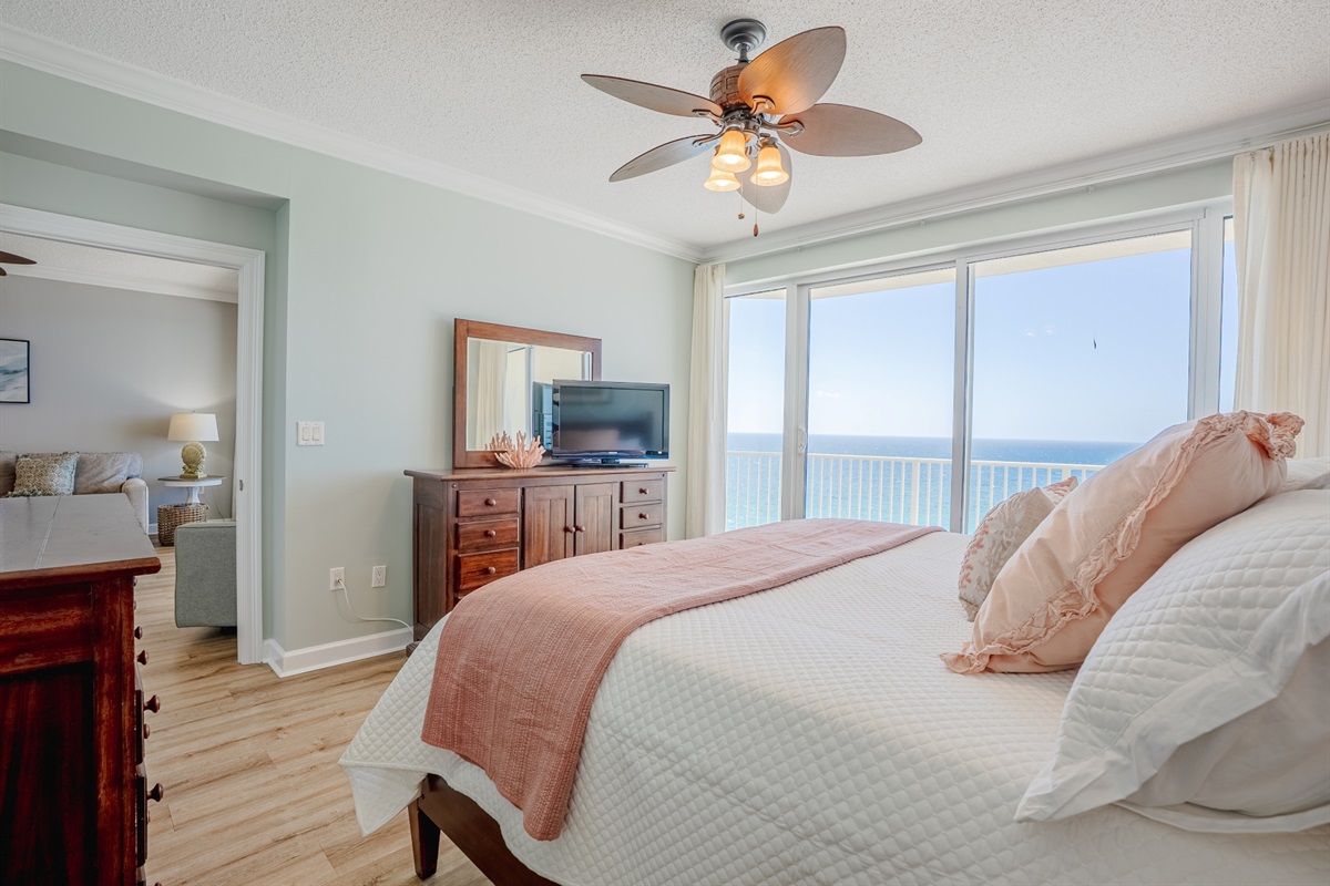 Bedroom #1 with balcony access and king bed