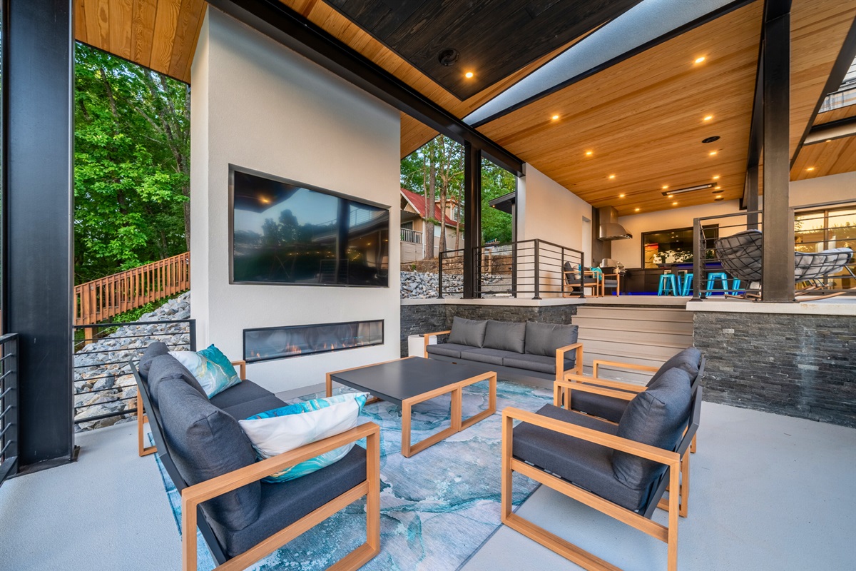This outdoor living room combines luxury and functionality, offering a perfect spot for entertaining or unwinding.