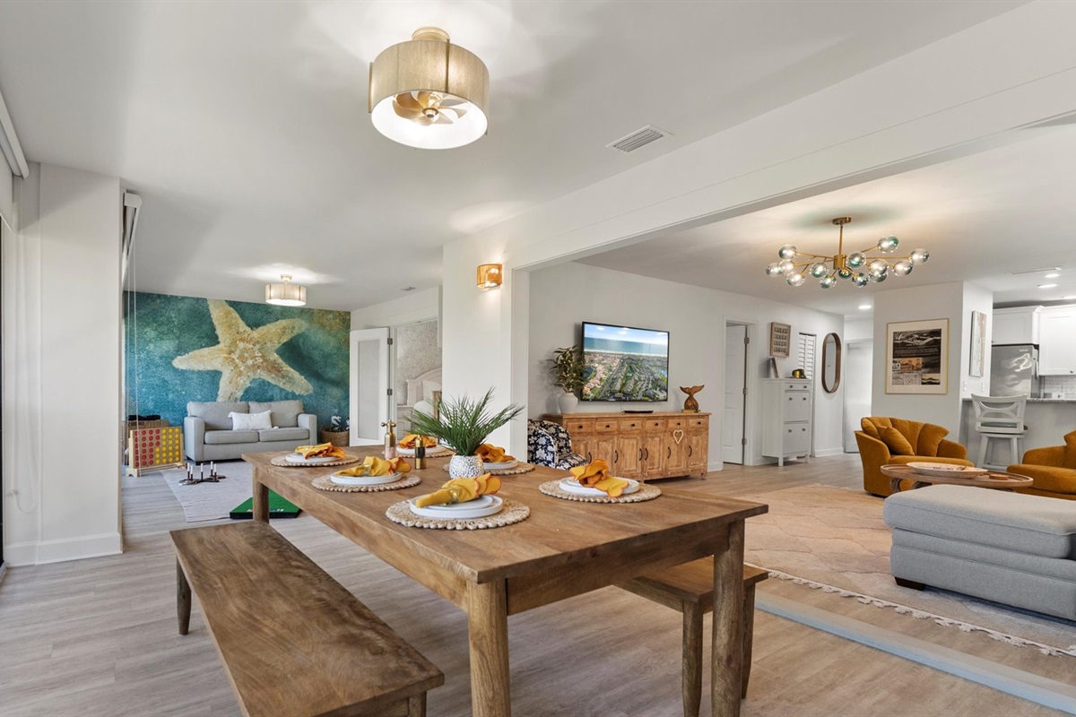 Coastal textures, smart TV, and breezy open layout perfect for gathering