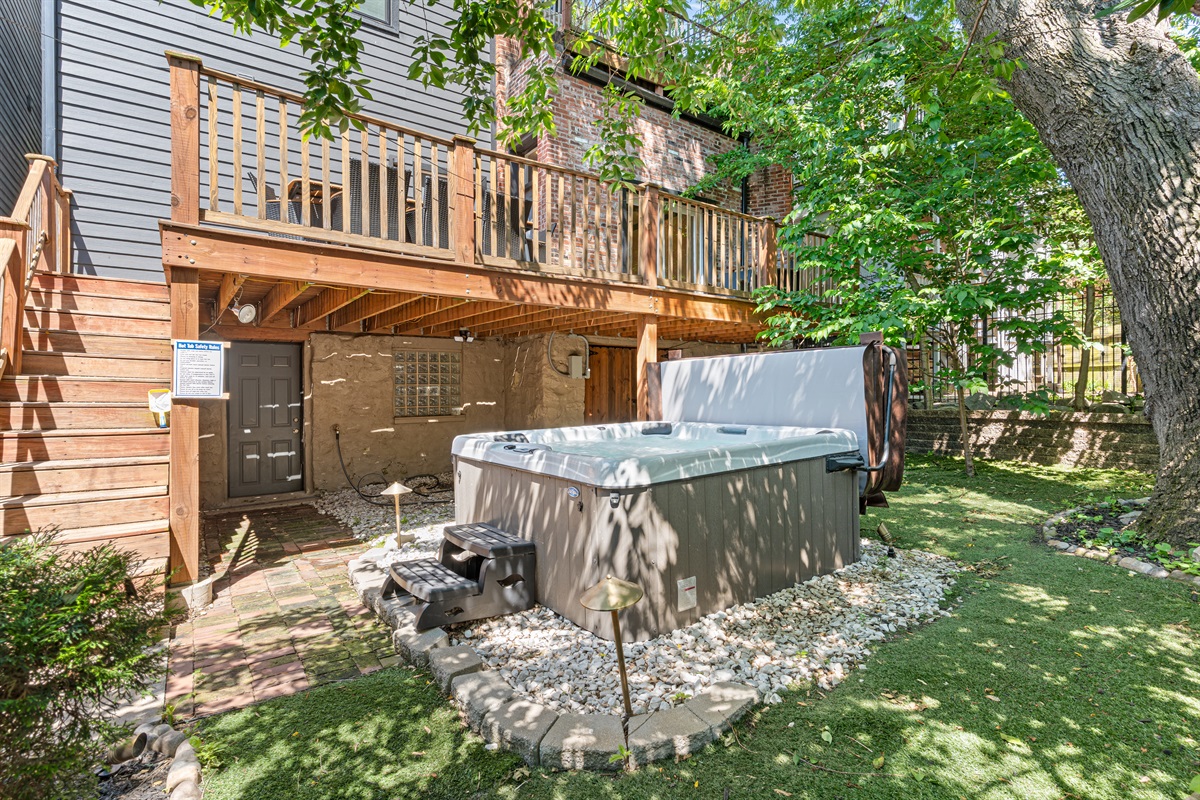 Soak in the hot tub while enjoying the privacy of the fenced backyard.