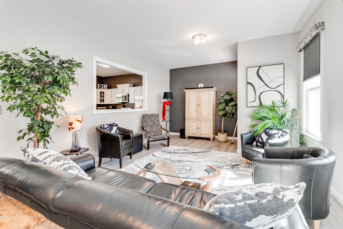 Living Room: Bright open space with modern decor, perfect for relaxation and gatherings!